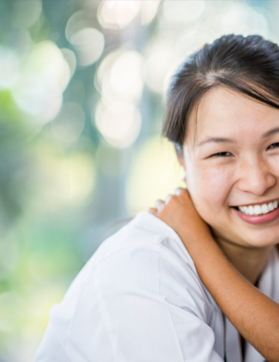 A woman hugging her child
